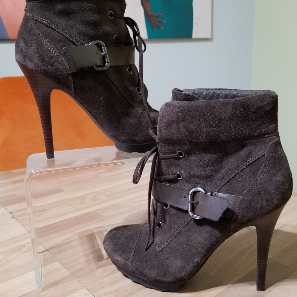 Guess 4.5 heeled bootie. Color is mink (brown/gray) tone with strapping